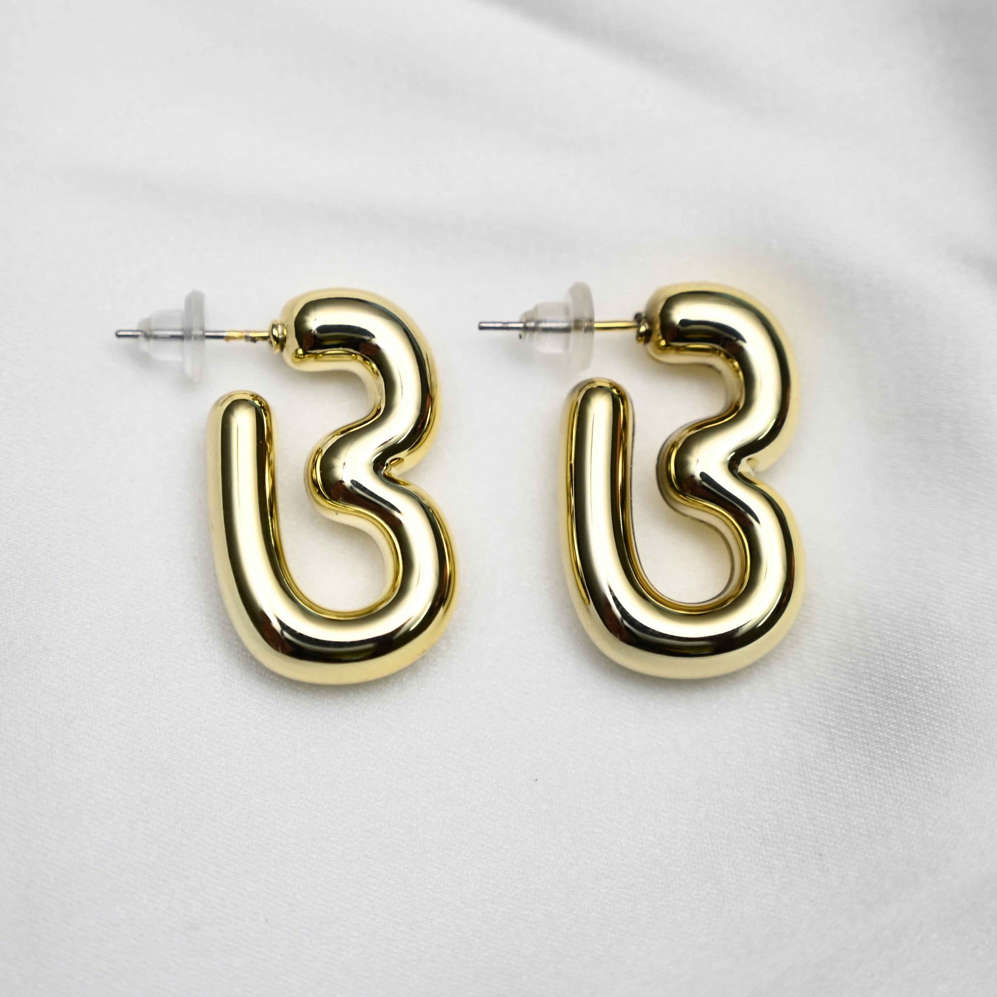 Gold inflated earring