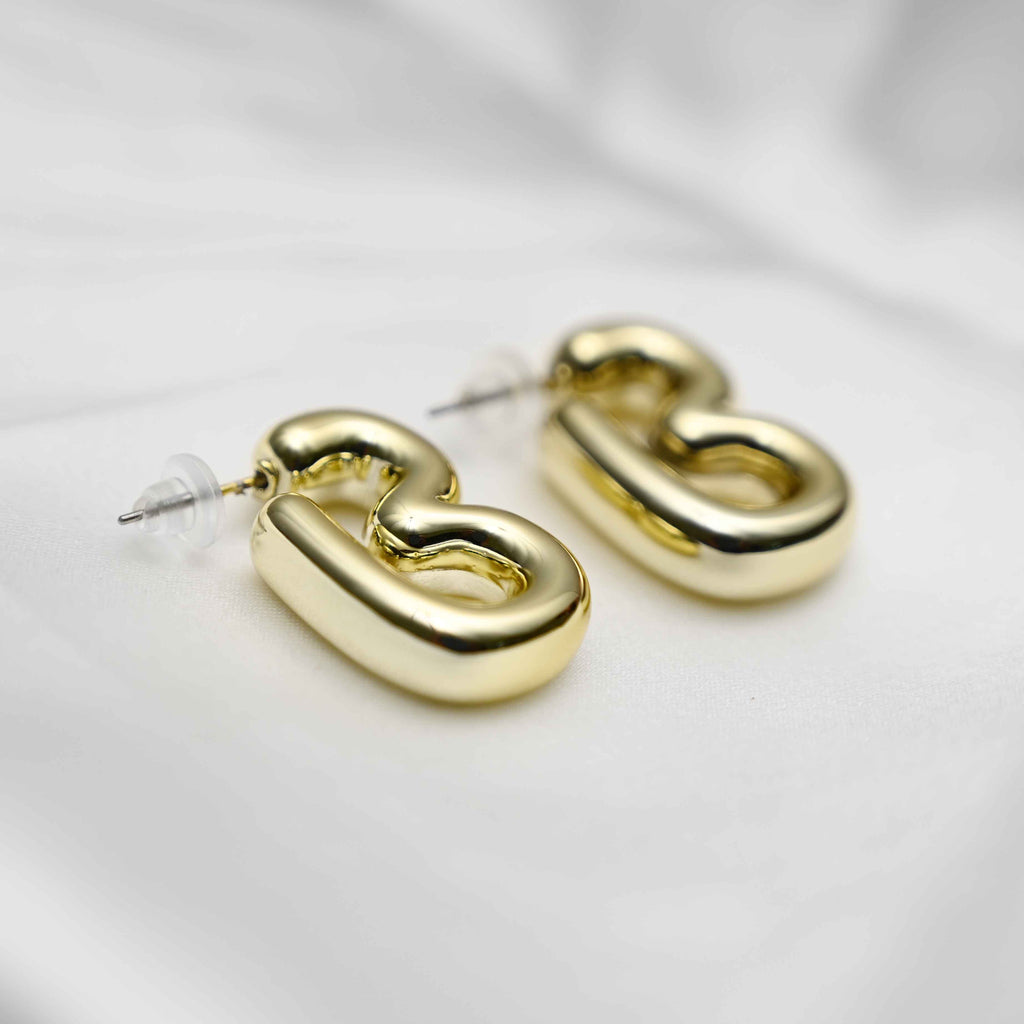 Gold inflated earring