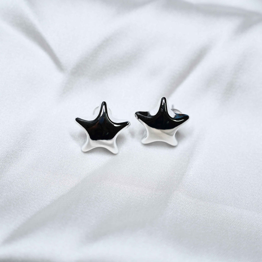Silver star earring