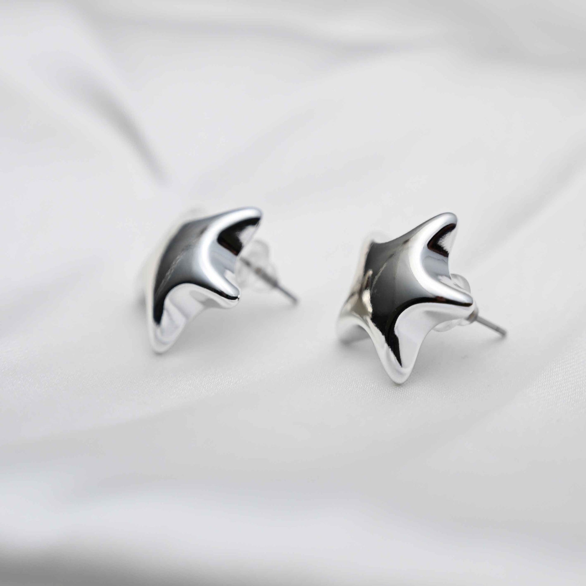 Silver star earring
