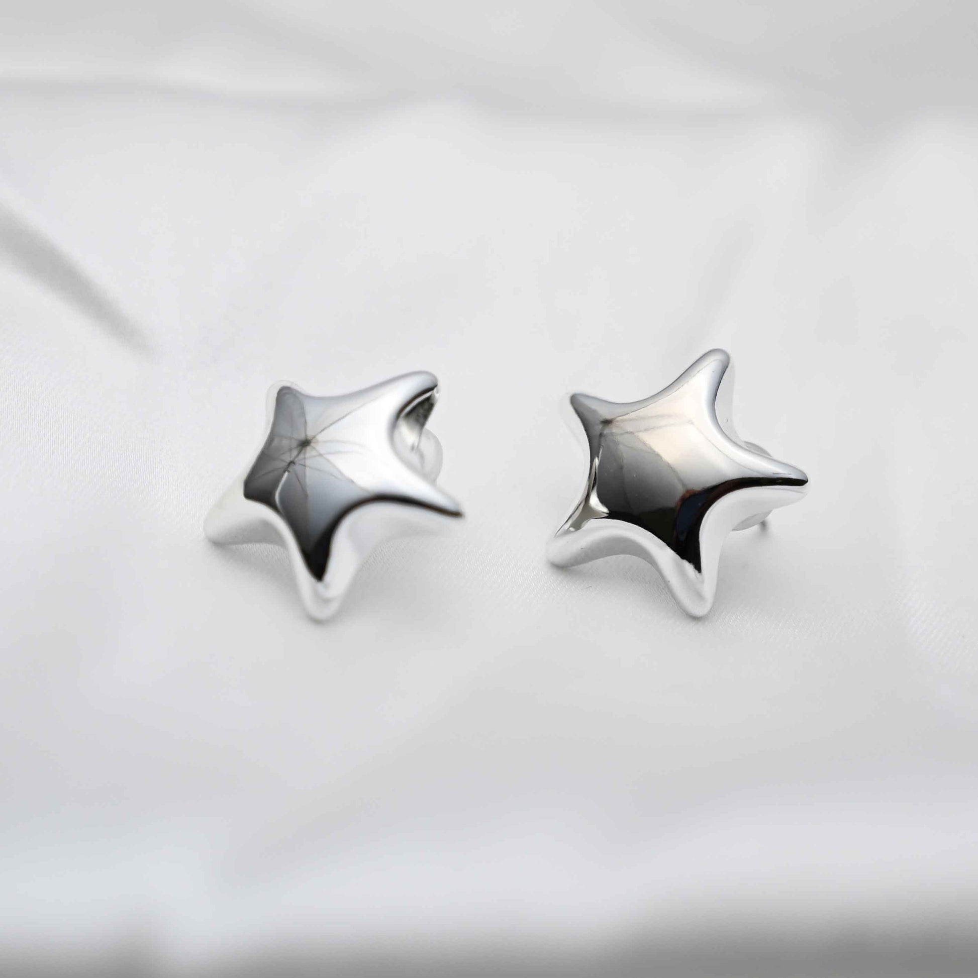 Silver star earring
