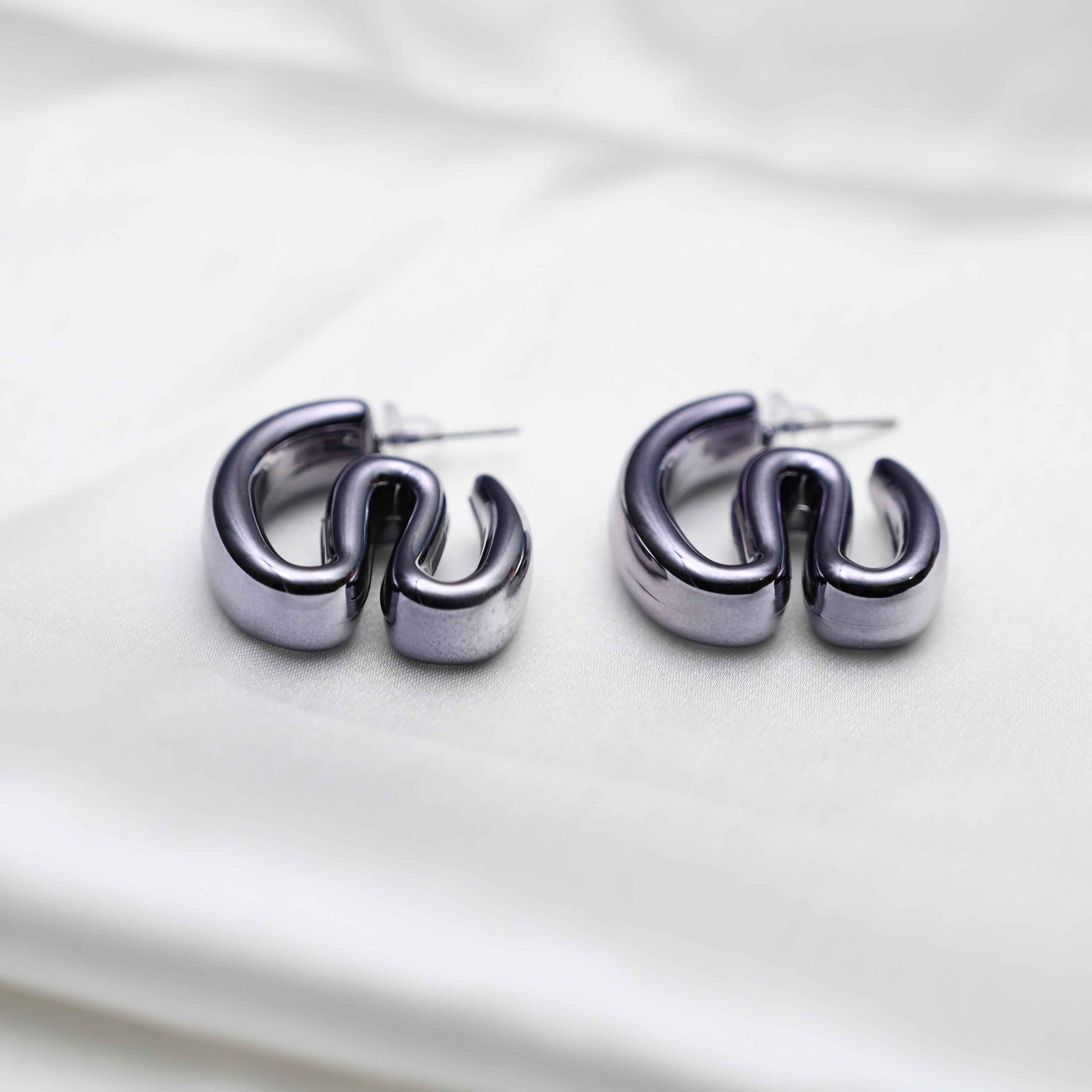 Dark silver inflated earrings